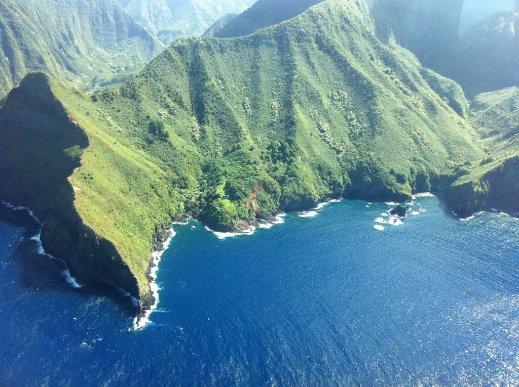 Should you plan a trip to Molokai for your first trip to Hawaii? Image of the coastline of Molokai in Hawaii.