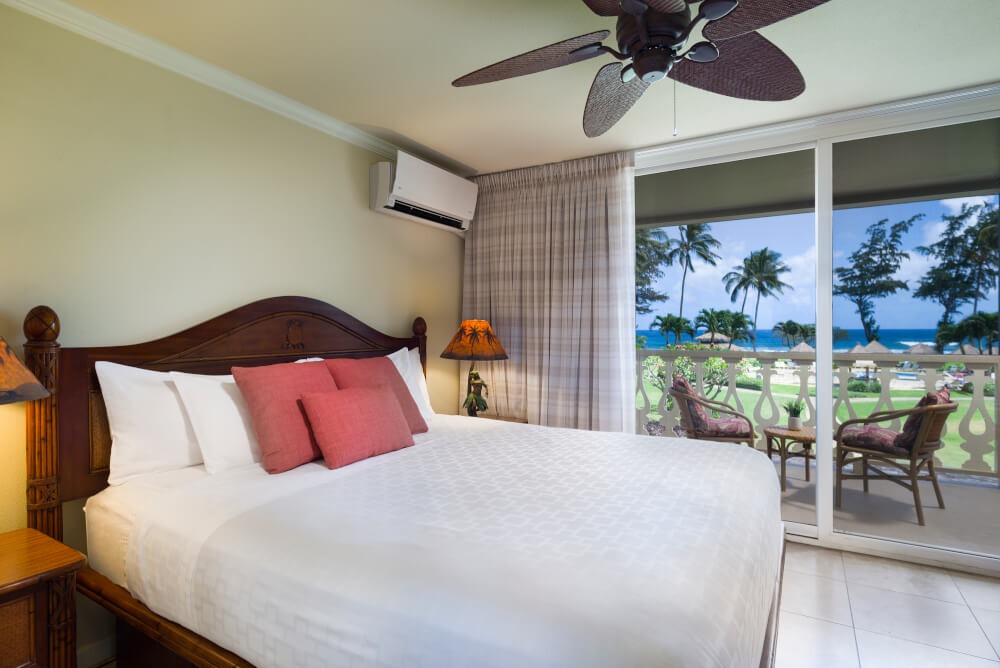 Hawaii on a Budget: Top 10 Cheap Places to Stay in Kauai, featured by top Hawaii travel blog, Hawaii Travel with Kids: The Aston Islander on the Beach is a budget-friendly hotel on Kauai