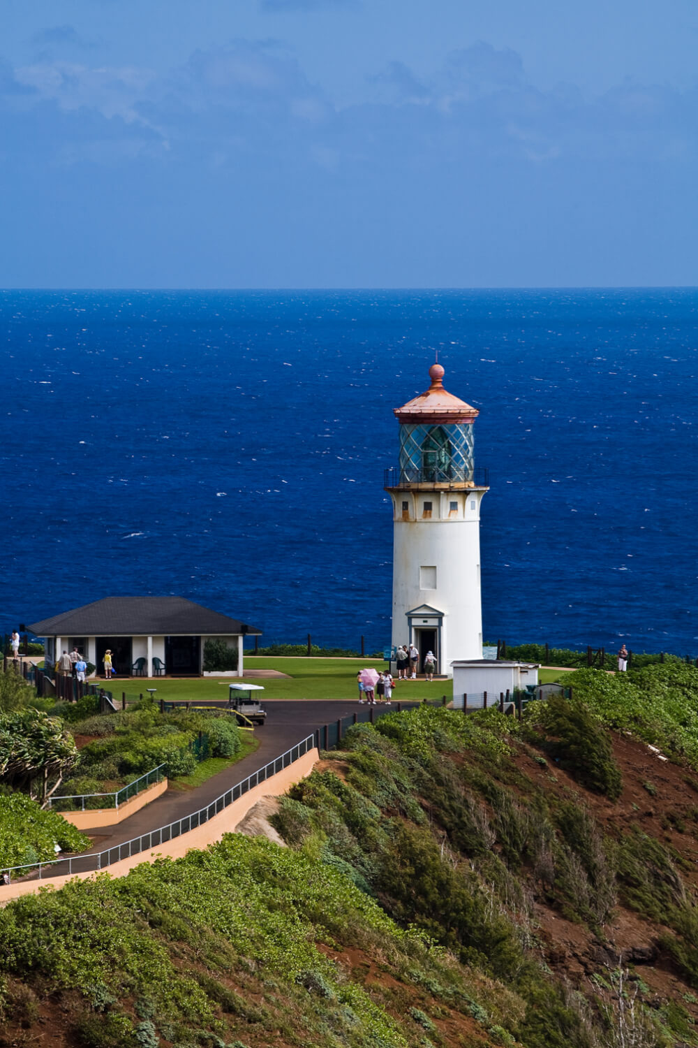Tips for Hawaii on a Budget featured by top Hawaii blog, Hawaii Travel with Kids: Kids will love running around Kilauea Lighthouse and looking for birds, one of the free things to do on Kauai for families