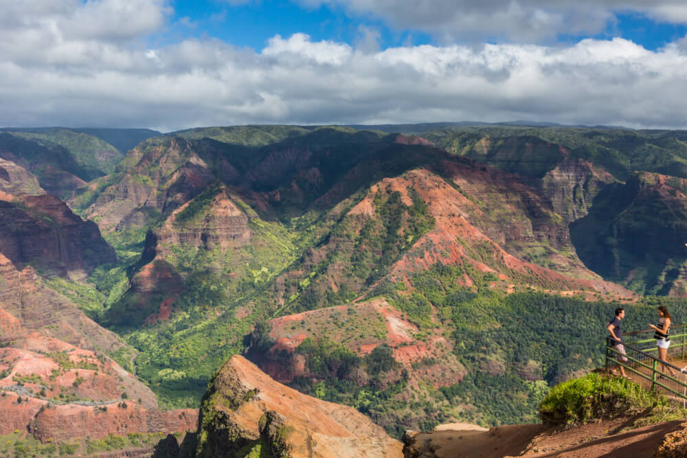 The Best 21 Free Things to do on Kauai with Kids featured by top Hawaii travel blog, Hawaii Travel with Kids: Waimea Canyon is one of the best free things to do on Kauai and has awesome Kauai hikes and views