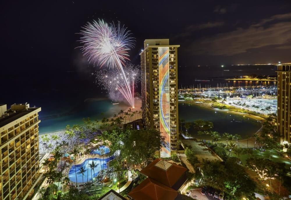 Top 6 Free Things to Do on Oahu featured by top Hawaii blog, Hawaii Travel with Kids: The Hilton Hawaiian Village has a free fireworks in Waikiki show every Friday