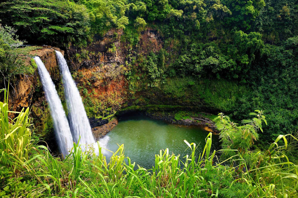 Hawaii on a Budget: What Not to Do in Hawaii to Save Time and Money, tips featured by top Hawaii travel blog, Hawaii Travel with Kids: Top 11 Best Kauai Waterfalls you Should Visit featured by top Hawaii travel blog, Hawaii Travel with Kids: Wailua Falls is one of the best Kauai waterfalls and a top Kauai attraction