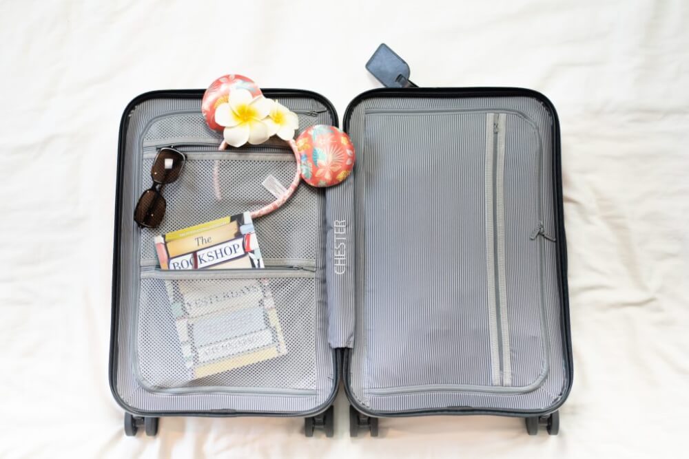 Tips for what to take to Hawaii on a Budget featured by top Hawaii blog, Hawaii Travel with Kids: Save money on luggage by using carry on luggage and skipping the checked bag fees