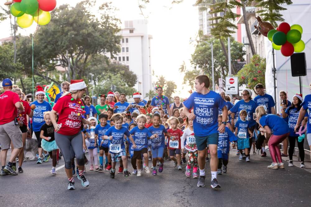 Holiday volunteer opportunities in Hawaii for families featured by top Hawaii blog, Hawaii Travel with Kids: Make A Wish Hawaii Jingle Rock Run