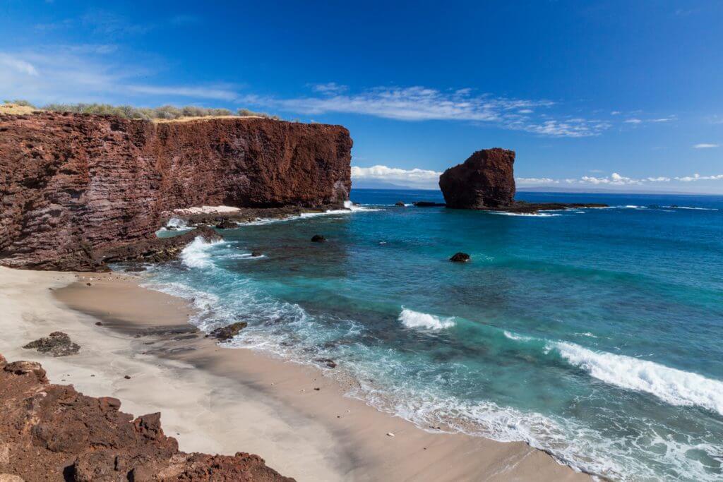 Should you visit Lanai when planning a Hawaii vacation? Image of the cliffs near Puu Pehe (Sweetheart Rock) on Lanai