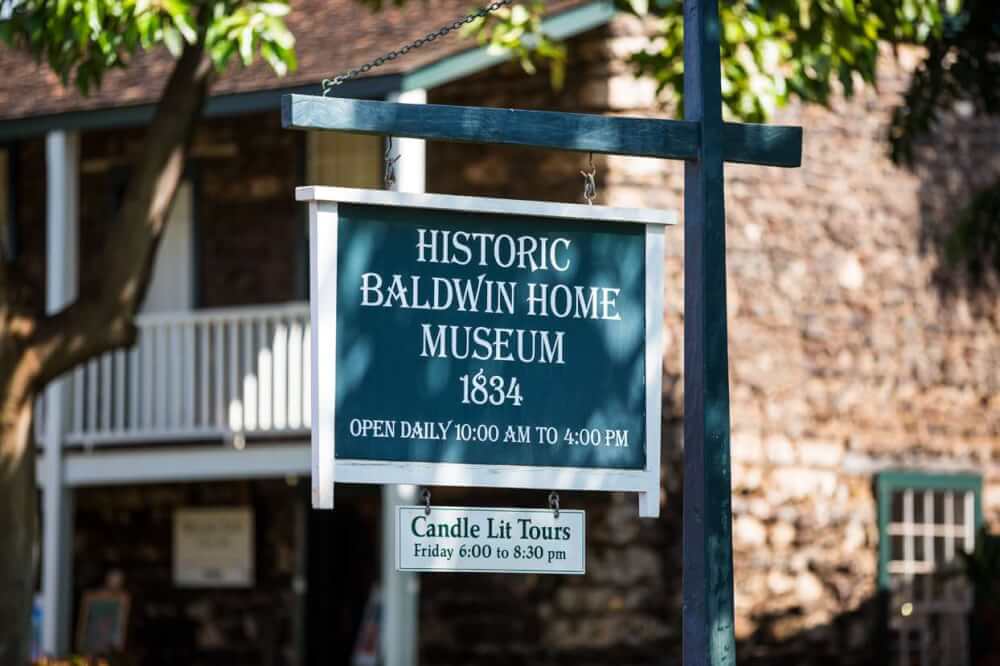 Things to do in Lahaina Maui featured by top Hawaii blog, Hawaii Travel with Kids: Sign outside the Historic Baldwin Home Museum, which is an interesting thing to do in Lahaina, Maui