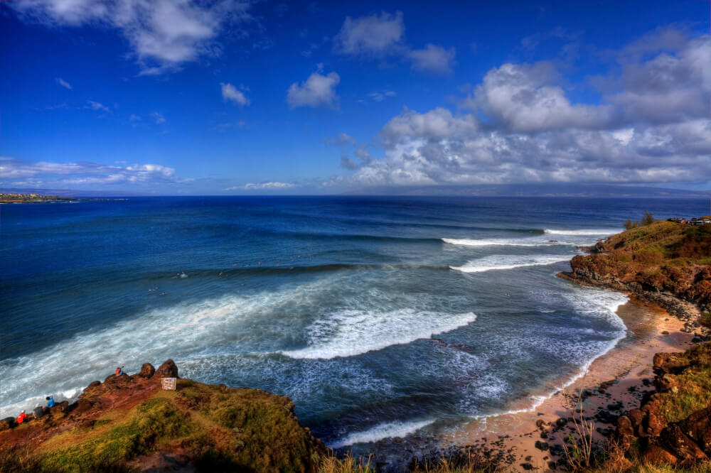 Best Places for Kayaking in Hawaii featured by top Hawaii blogger, Hawaii Travel with Kids: Honolua Bay, Maui is perfect for snorkeling or surfing