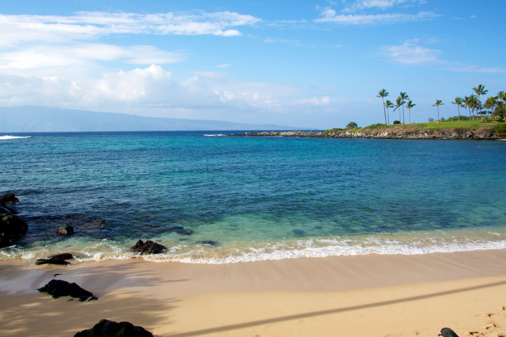 Top 10 Romantic Hawaii Beach Proposal Ideas + Locations featured by top Hawaii blog, Hawaii Travel with Kids: Kapalua Bay on Maui is great for snorkeling