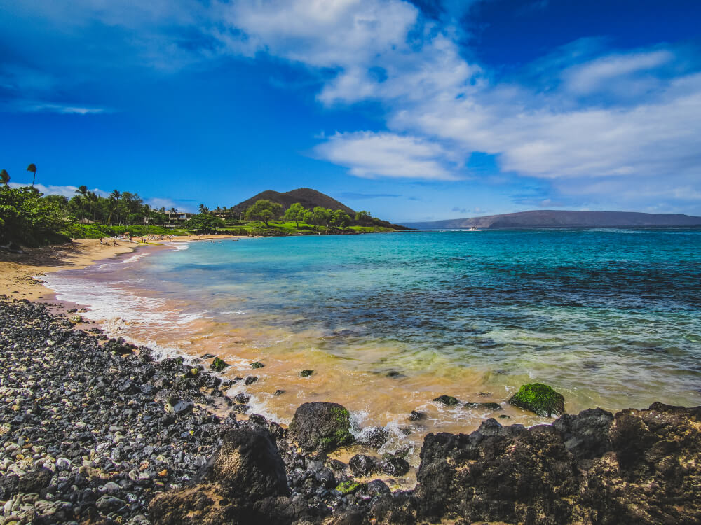 Best Snorkeling in Maui featured by top Hawaii blog, Hawaii Travel with Kids: Maluaka Beach aka Turtle Town in Maui is perfect for snorkeling