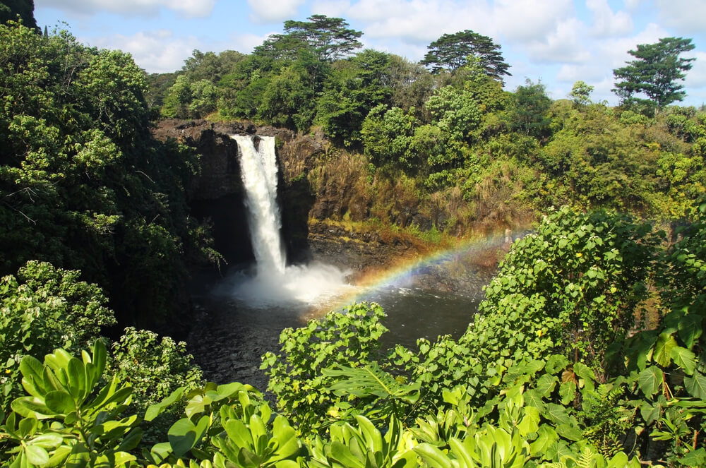 7 Prettiest Best Hawaii Waterfalls to visit featured by top Hawaii blog, Hawaii Travel with Kids: Rainbow Falls is one of the most popular Big Island waterfalls