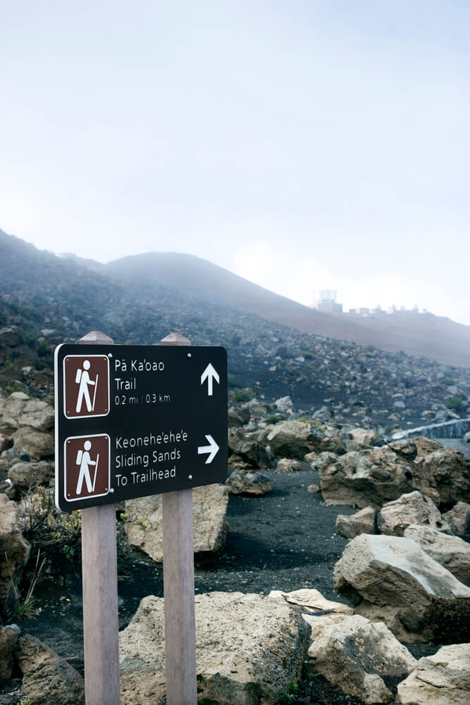 The Best Maui Hiking Trails featured by top Hawaii blog, Hawaii Travel with Kids: Trail sign at the Haleakala National Park for Sliding Sands hike on Maui