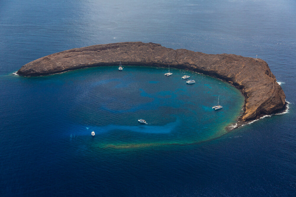 Exploring Molokini Crater in Maui, a guide featured by top Hawaii blog, Hawaii Travel with Kids.