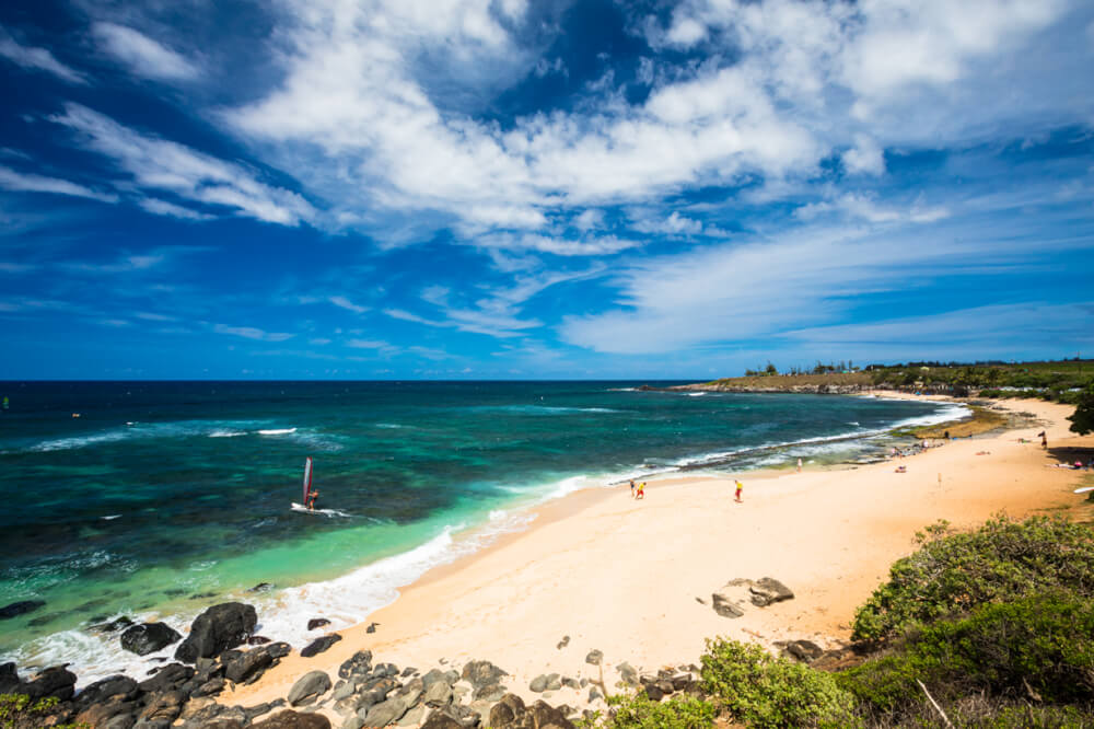 Where to See Turtles in Maui, tips featured by top Hawaii blog, Hawaii Travel with Kids: image of Hookipa Beach and bay in Paia, Maui