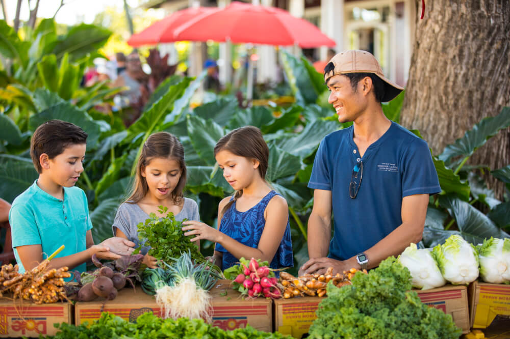 Kids at the Kauai Culinary Market at the Shops at Kukuiula on Kauai