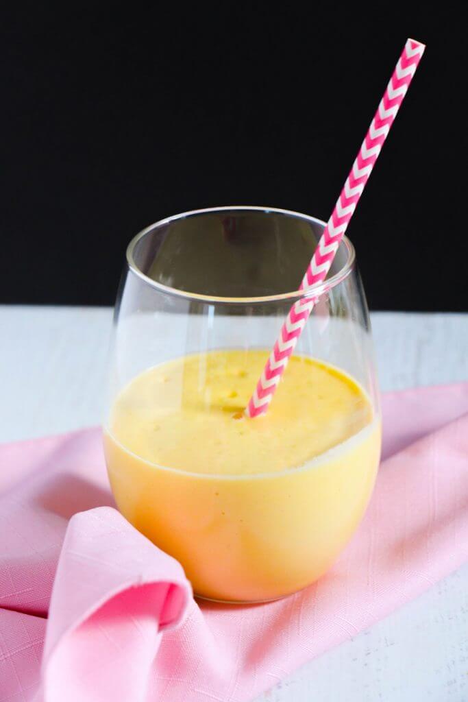 Hawaiian Tropical Smoothie Recipes to Make at Home featured by top Hawaii blog, Hawaii Travel with Kids: Looking for a smoothie with the perfect combination of sweet and smooth? This vanilla mango smoothie is just what you're looking for! 