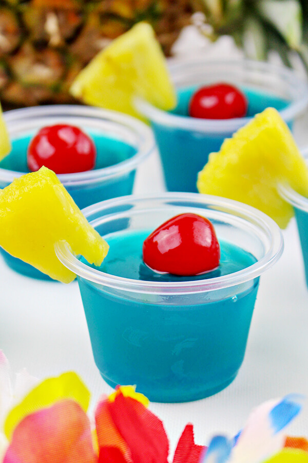 40 Hawaiian Cocktails To Try At Home featured by top Hawaii blog, Hawaii Travel with Kids: Blue Hawaiian Jello Shots Recipe