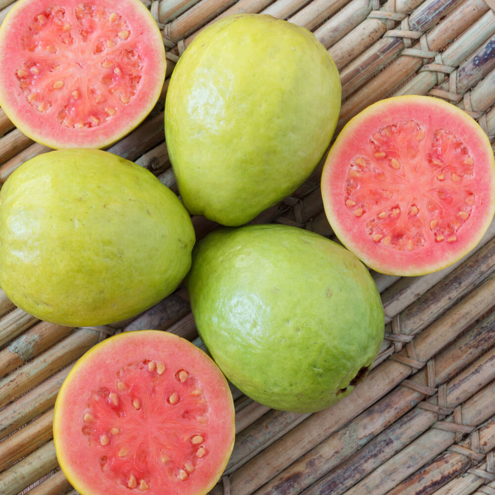 Fresh guava on a wooden table
