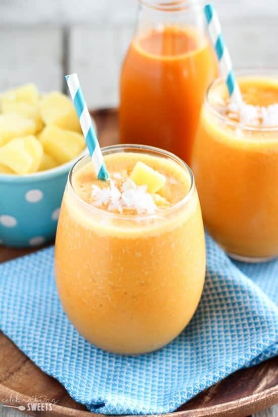 Hawaiian Tropical Smoothie Recipes to Make at Home featured by top Hawaii blog, Hawaii Travel with Kids: Pineapple Carrot Coconut Smoothie - A healthy smoothie made with carrot juice, pineapple, banana and coconut yogurt. Light, refreshing and filled with tropical flavors.