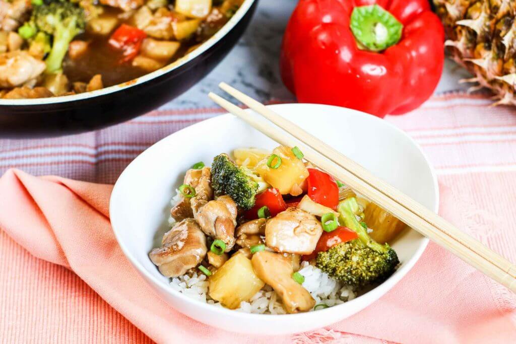 Pineapple Chicken Stir Fry Recipe featured by top Hawaii blog, Hawaii Travel with Kids.