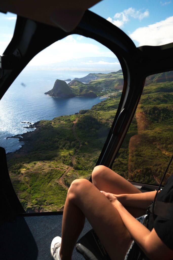 A Complete Travel Guide to Maui with Kids featured by top Hawaii travel blog, Hawaii Travel with Kids: Photo of a helicopter ride from Maui to Molokai #helicopter #hawaii #maui #molokai