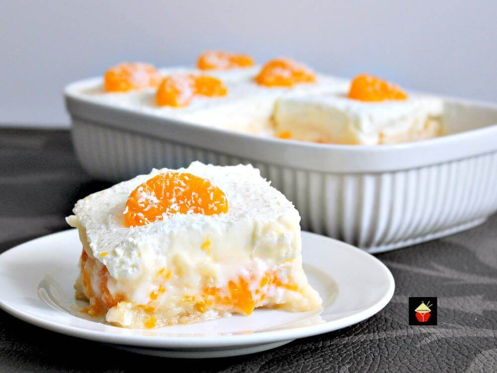  61 Delicious Coconut Dessert Recipes Perfect for Summer featured by top Hawaii blog, Hawaii Travel with Kids:Easy Mandarin Dessert. Amazingly easy and so delicious. Simply OUT OF THIS WORLD! | Lovefoodies.com