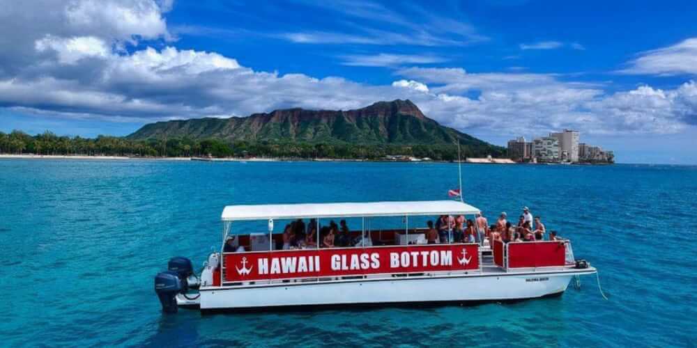 25 Amazing activities in Waikiki with kids featured by top Hawaii blog, Hawaii Travel with Kids: Hawaii Glass Bottom Waikiki boat tour