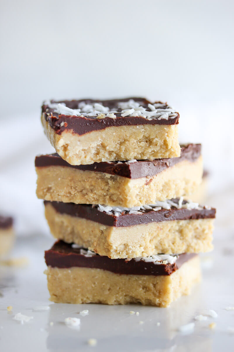 61 Delicious Coconut Dessert Recipes Perfect for Summer featured by top Hawaii blog, Hawaii Travel with Kids: Raw Chocolate Coconut Cashew Bars | dishingouthealth.com