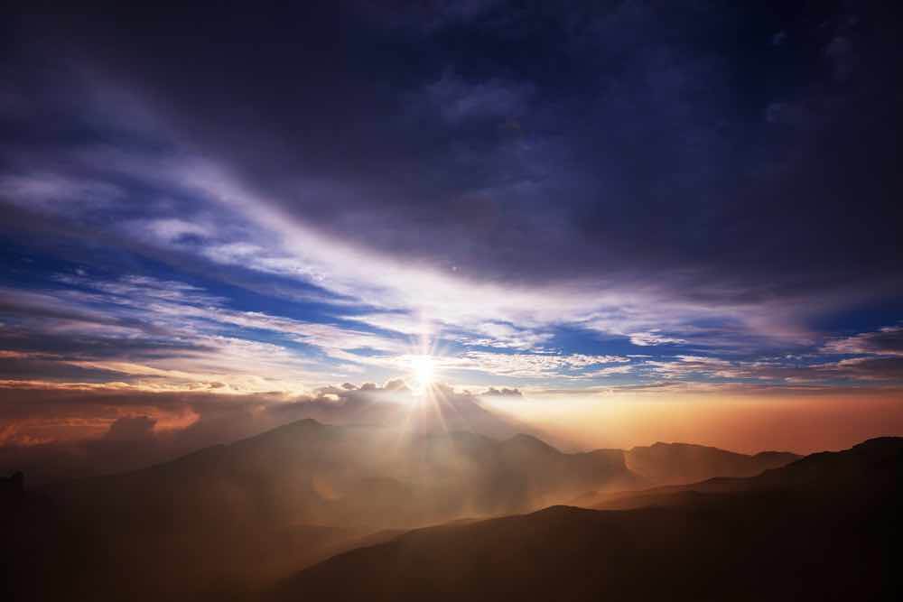 Ultimate Guide to Camping on Maui with Kids featured by top Hawaii blogger, Hawaii Travel with Kids: Beautiful sunrise scene on Haleakala volcano, Maui island, Hawaii