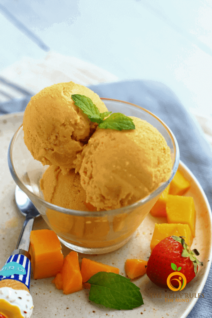 61 Delicious Coconut Dessert Recipes Perfect for Summer featured by top Hawaii blog, Hawaii Travel with Kids: Vegan Mango Coconut Ice Cream