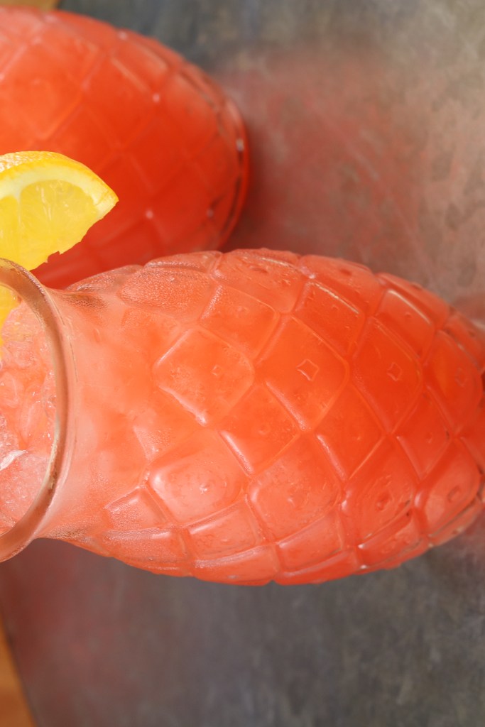 Vodka Party Punch garnished with an orange slice