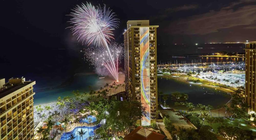 Top 8 Romantic Oahu Honeymoon Resorts featured by top Hawaii blog, Hawaii Travel with Kids: Fireworks at the Hilton Hawaiian Village