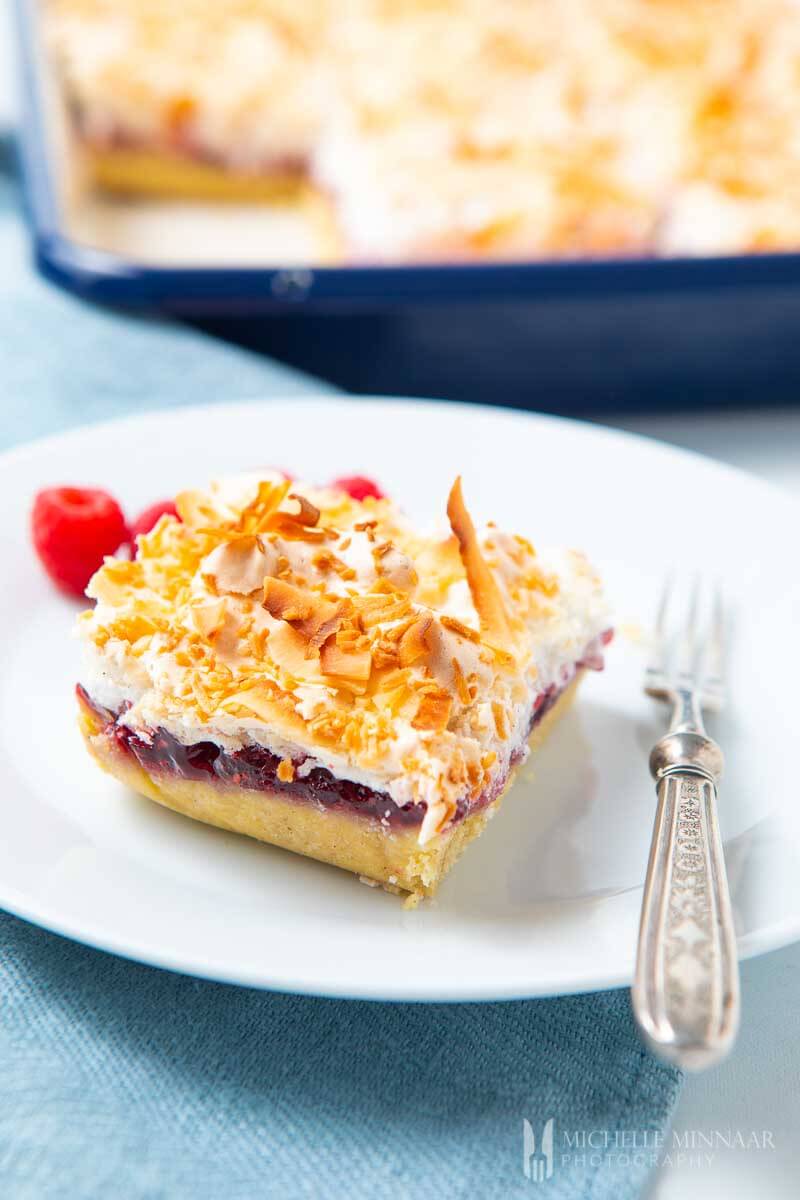 61 Delicious Coconut Dessert Recipes Perfect for Summer featured by top Hawaii blog, Hawaii Travel with Kids: Slice of Louise Cake 