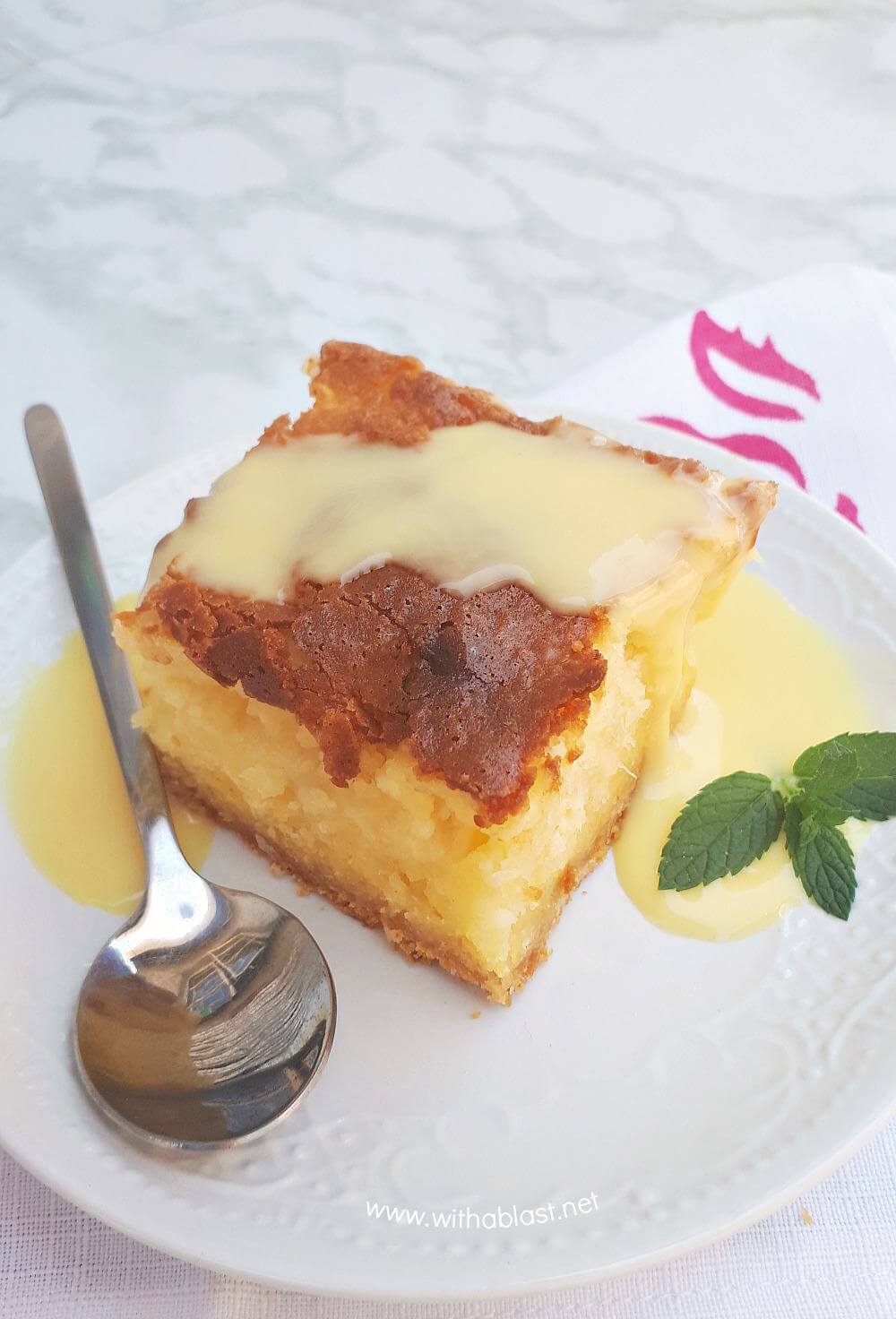 Pineapple Dessert Recipe Roundup by top Hawaii blog Hawaii Travel with Kids: Gooey Coconut Pineapple Butter Cake is a moist, delicious cake and no need for frosting. Easy cake starting with a cake mix and with cream cheese too!