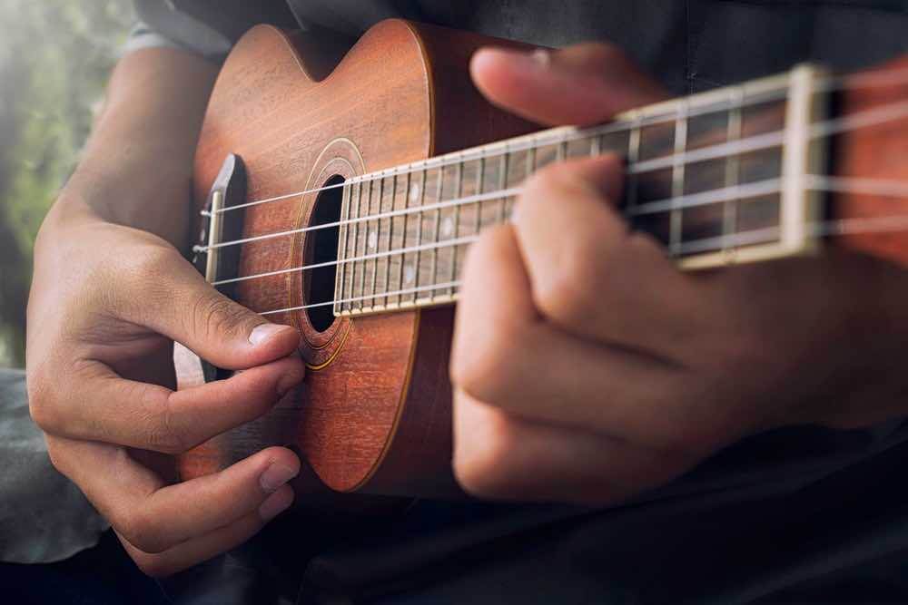 Man playing ukulele in Hawaii