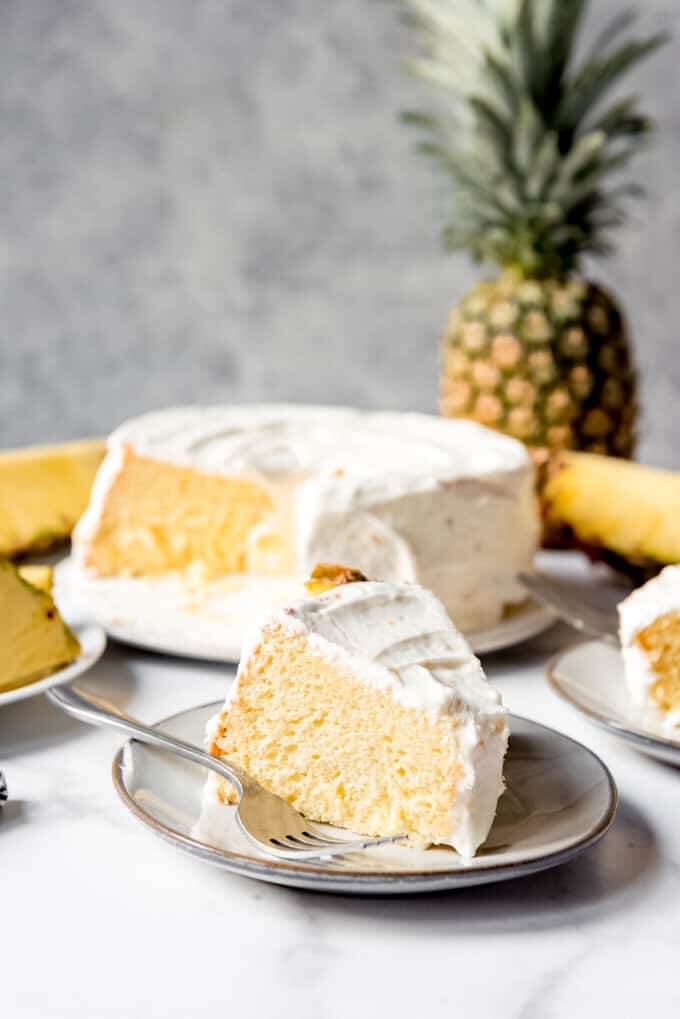 Pineapple Dessert Recipe Roundup by top Hawaii blog Hawaii Travel with Kids: An image of a slice of light and fluffy pineapple sponge cake.