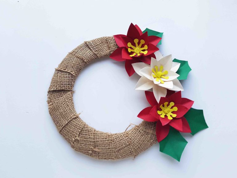 41 Easy Christmas Paper Crafts to Make for the Holidays: Paper Poinsettia Wreath