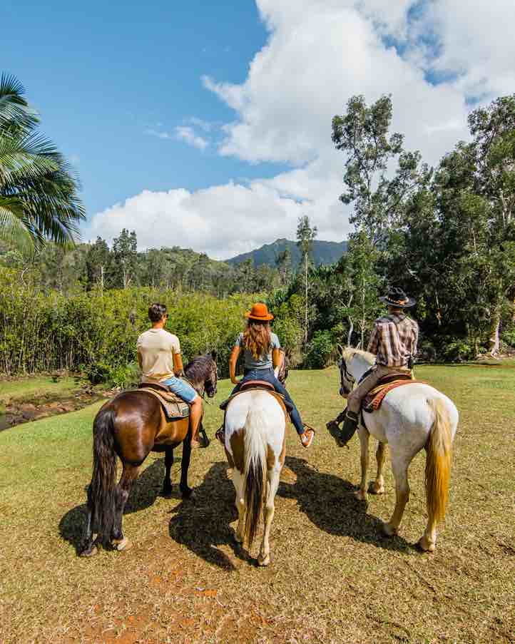 101 Best Things to Do on Kauai with Kids featured by top Hawaii blog, Hawaii Travel with Kids: One of the best things to do on Kauai is go horseback riding