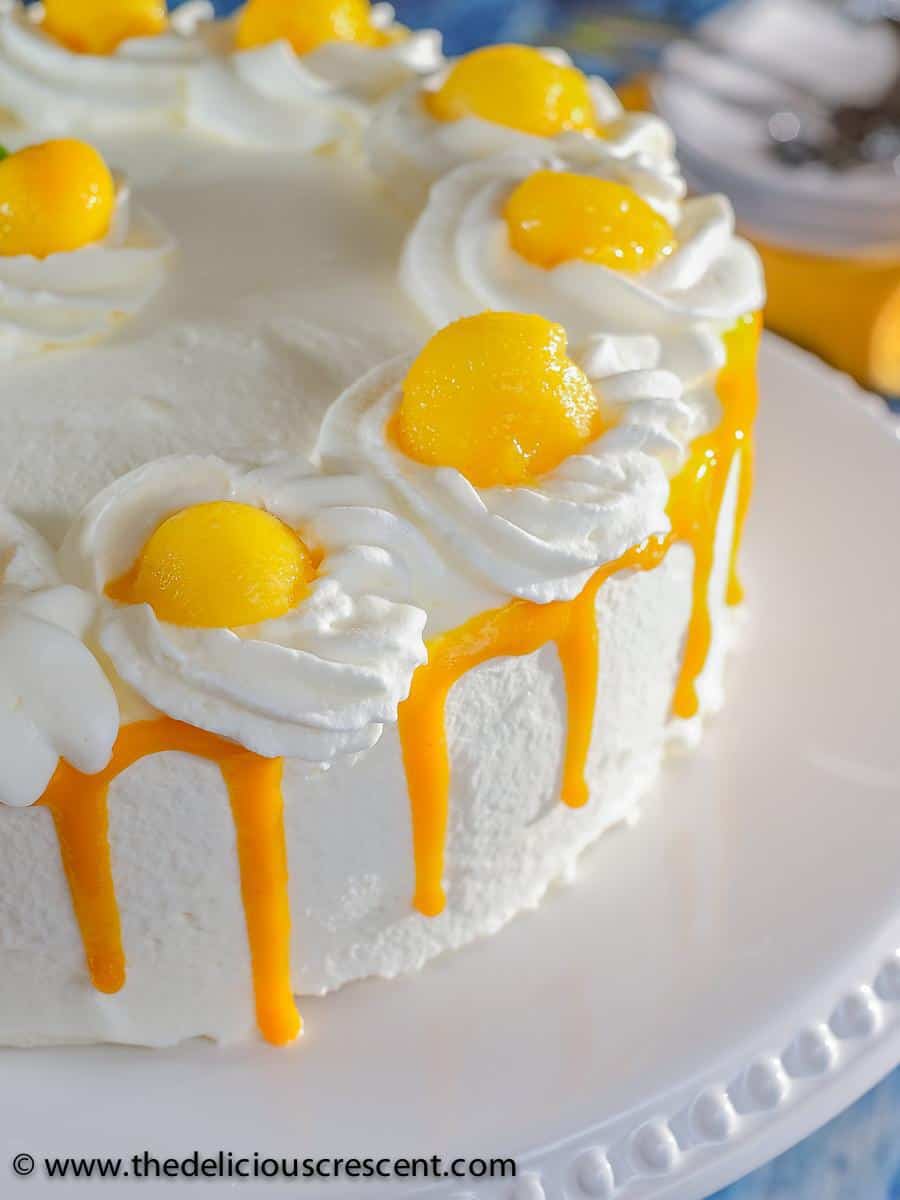 Best Mango dessert recipes by top Hawaii blog Hawaii Travel with Kids: Front view of a mango layer cake