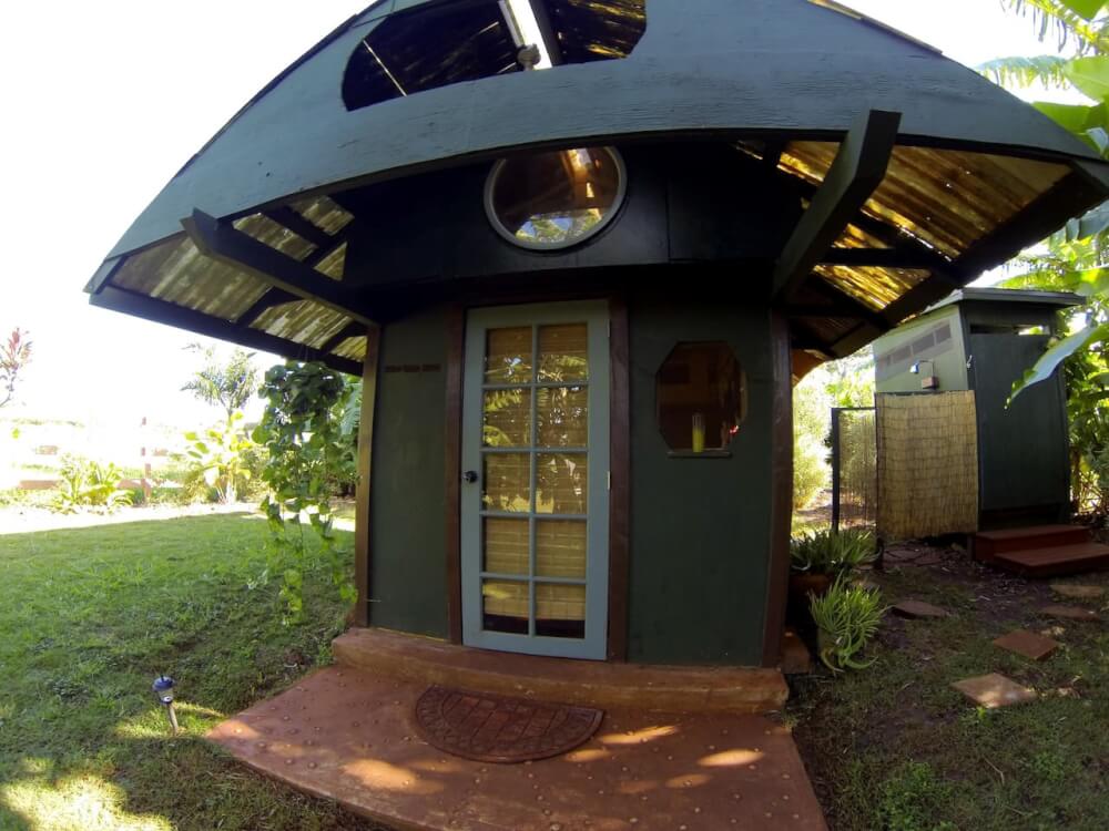 Oahu Surfing On The North Shore, a complete guide featured by top Hawaii blog, Hawaii Travel with Kids: The Hobbit Hut and shower and bathroom to the right