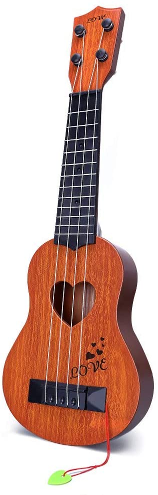 Find out the best toddler ukulele to buy in this ukulele guide by top Hawaii blog Hawaii Travel with Kids. Image of a YEZI ukulele