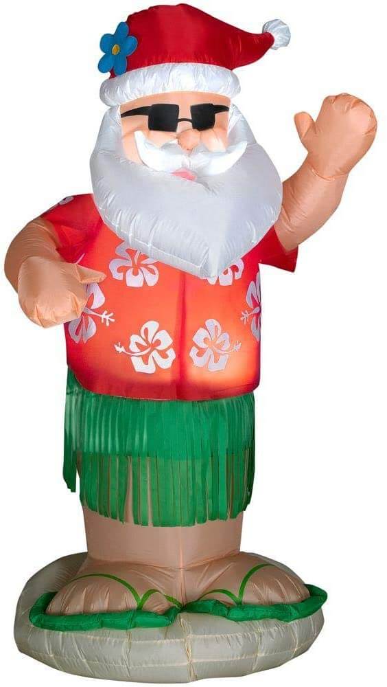 Best Hawaiian Christmas Decorations featured by top Hawaii blogger, Hawaii Travel with Kids: Add some Hawaiian Christmas decorations to your home this holiday season with these top Hawaii Christmas decorations ideas from top Hawaii blog Hawaii Travel with Kids. Image of Hawaiian Santa Inflatable