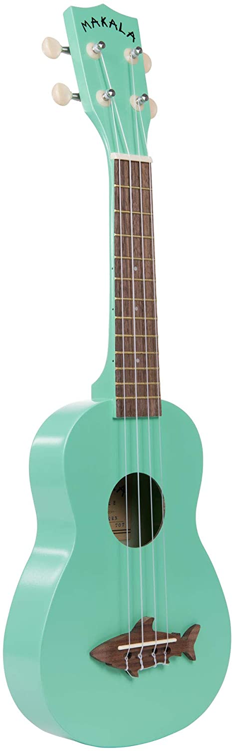 Find out the best toddler ukulele to buy in this ukulele guide by top Hawaii blog Hawaii Travel with Kids. Image of a Makala ukulele