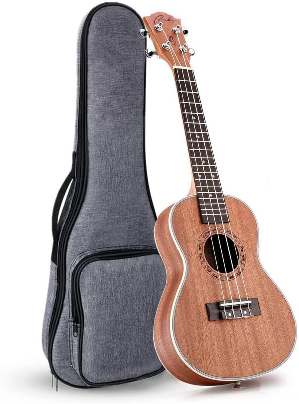 Find out the best left handed ukulele to buy in this ukulele guide by top Hawaii blog Hawaii Travel with Kids. Image of a left handed ukulele