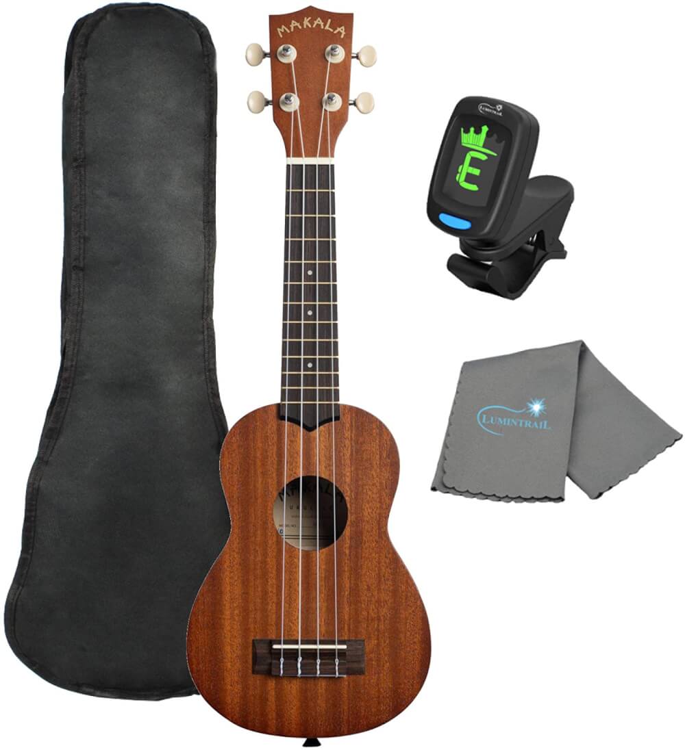 Find out the best kids ukulele to buy in this ukulele guide by top Hawaii blog Hawaii Travel with Kids. Image of Makala Ukulele Kit