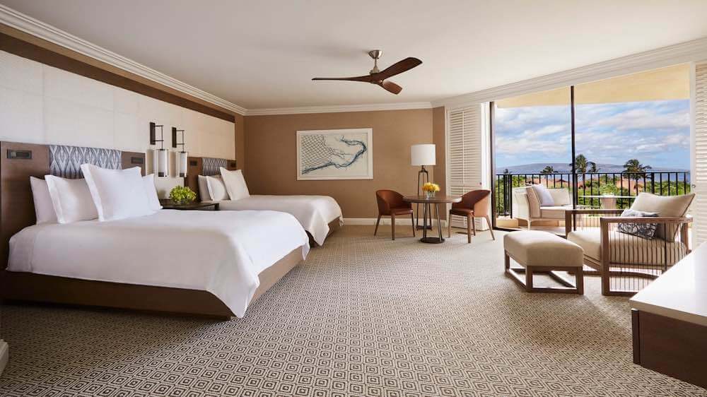 Top 5 Best Maui Luxury Hotels featured by top Hawaii blogger, Hawaii Travel with Kids: The Four Seasons Maui is a gorgeous Maui luxury resort. Image of the interior of a Four Seasons Maui room