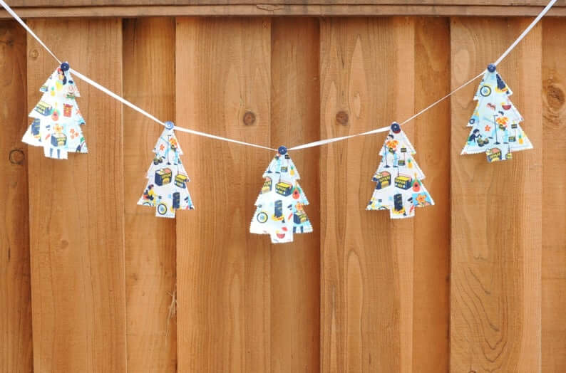 Best Hawaiian Christmas Decorations featured by top Hawaii blogger, Hawaii Travel with Kids: Add some Hawaiian Christmas decorations to your home this holiday season with these top Hawaii Christmas decorations ideas from top Hawaii blog Hawaii Travel with Kids. Image of SPAM Christmas Tree Bunting