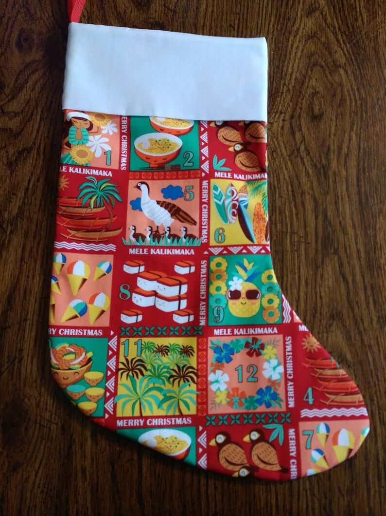 Best Hawaiian Christmas Decorations featured by top Hawaii blogger, Hawaii Travel with Kids: Add some Hawaiian Christmas decorations to your home this holiday season with these top Hawaii Christmas decorations ideas from top Hawaii blog Hawaii Travel with Kids. Image of Hawaiian Christmas stocking