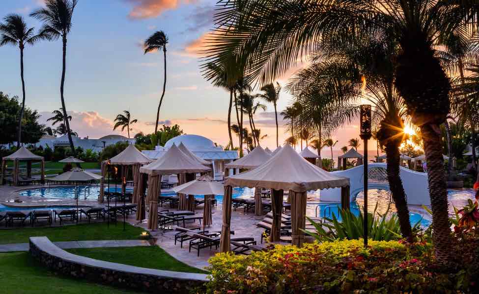 Top 5 Best Maui Luxury Hotels featured by top Hawaii blogger, Hawaii Travel with Kids: The Fairmont Kea Lani is one of the best Maui luxury hotels. Image of the pool area at this Maui hotel