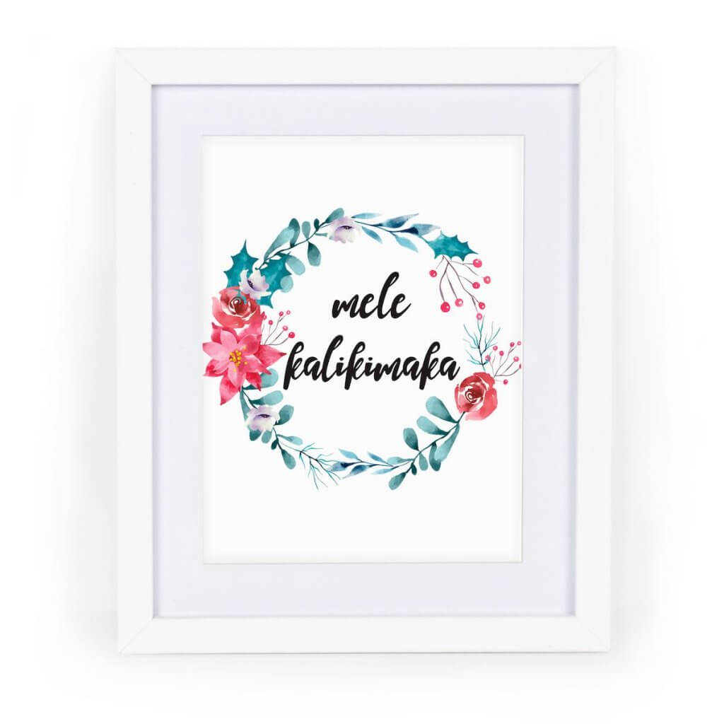 Download this free Hawaiian Christmas decoration Mele Kalikimaka sign this holiday season. Image of a sign that says Mele Kalikimaka in a white frame.