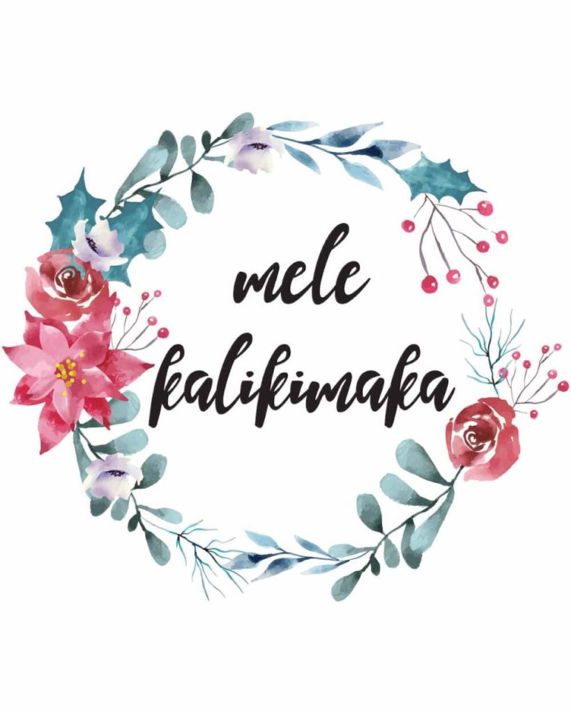 You'll want to download this adorable Mele Kalikimaka sign as part of your Hawaiian Christmas decorations. Image of a sign that says Mele Kalikimaka surrounded by tropical flowers.